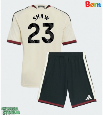 Manchester United Luke Shaw #23 Replika Babytøj Tredje sæt Børn 2026-27 Kortærmet (+ Korte bukser)